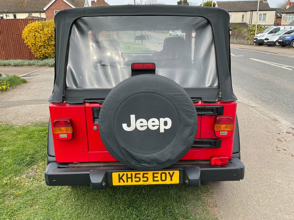 Jeep Wrangler Sahara Black #4