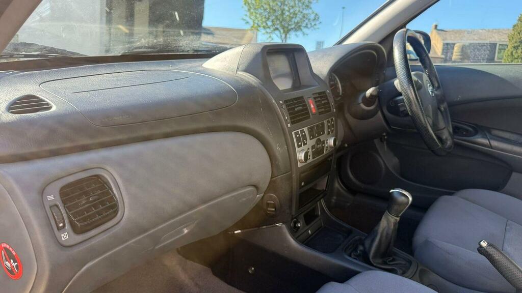 Nissan Almera Hatchback Black #30