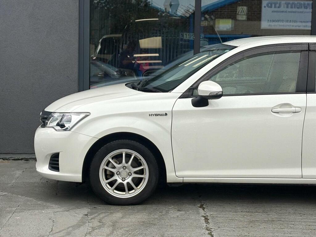 Toyota Corolla Axio Hybrid 1.5 Vvt-h Cvt White #6