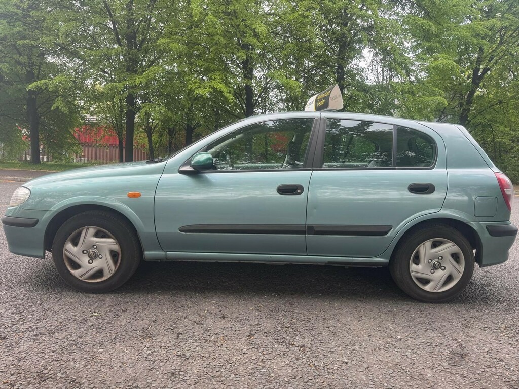 Nissan Almera Hatchback Blue #8