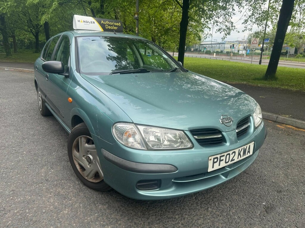 Nissan Almera Hatchback Blue #4