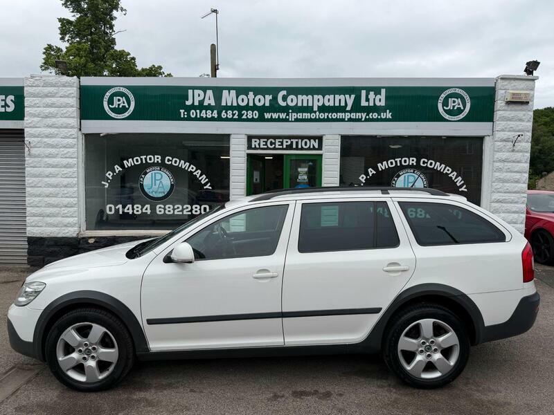 Skoda Octavia 2.0-tdi-scout-estate-5dr-diesel-manual-4wd-euro-5- White #2