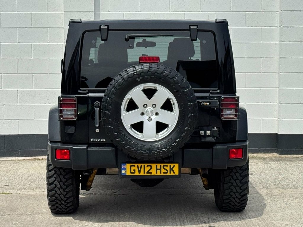 Jeep Wrangler Convertible Crd Sahara Unlimited 2012 Orange #25