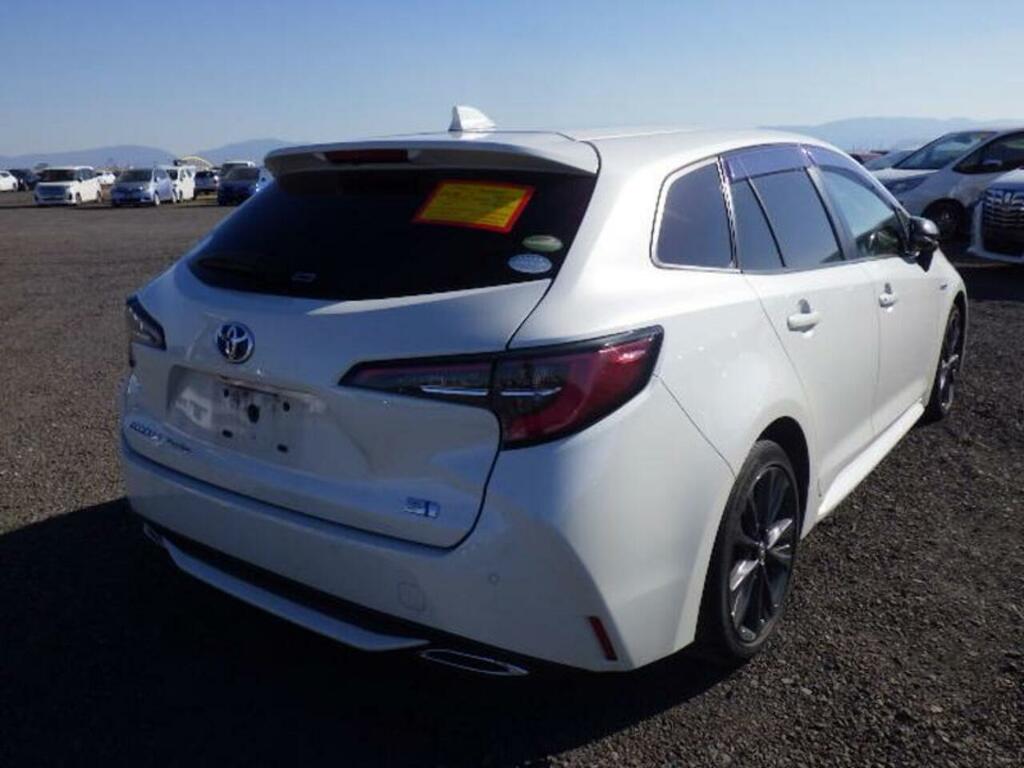 Toyota Corolla Hybrid Wxb White #6