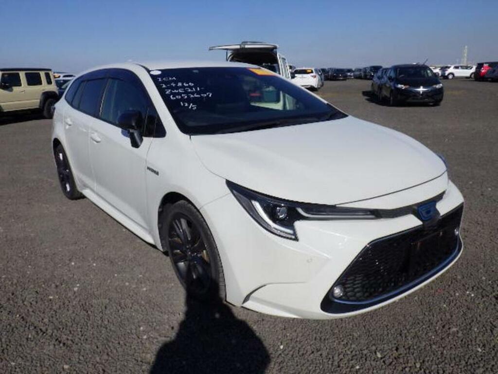 Toyota Corolla Hybrid Wxb White #2